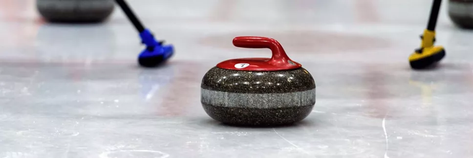 Curling rock on ice